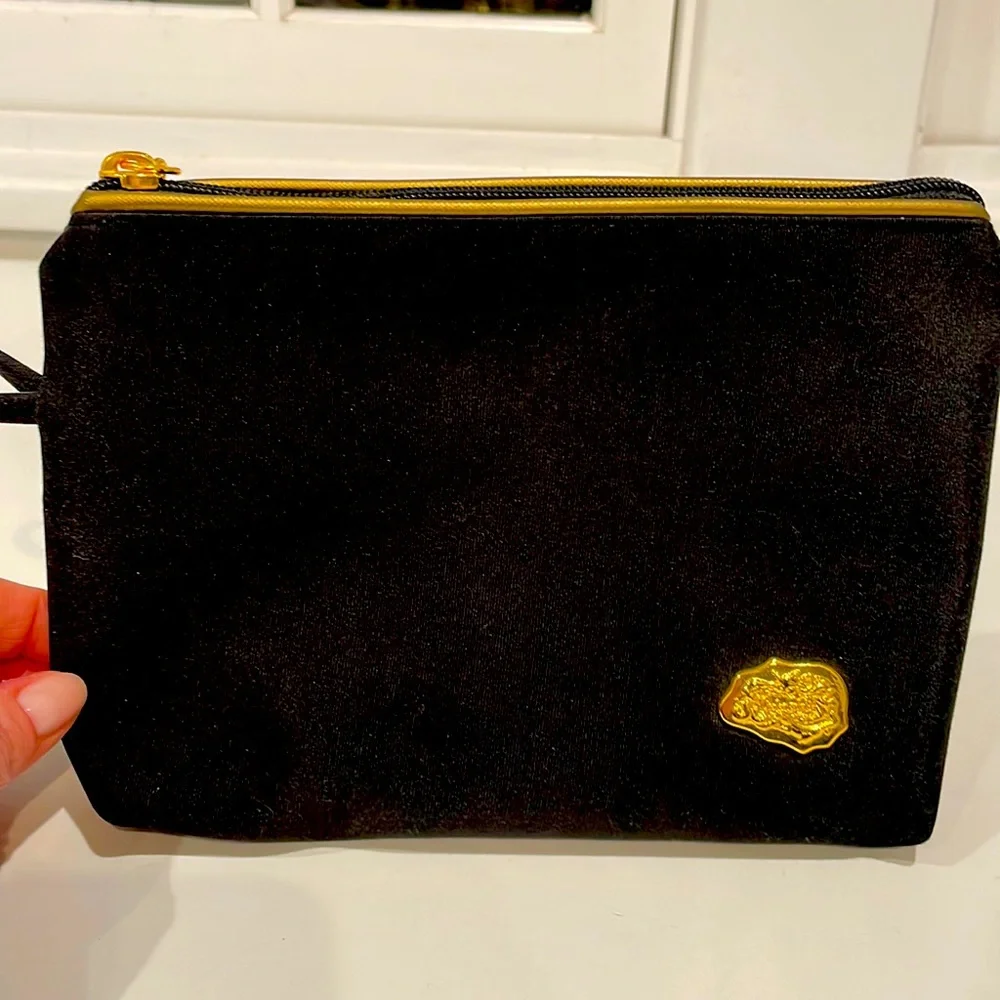 Carlos Falchi Zippered pouch in black with gold detail. New.